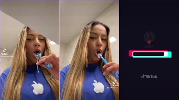 Sofia Lopes gravando um vídeo enquanto escova os dentes