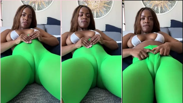 Wendy Mesi, de calça verde, se contorcendo de desejo