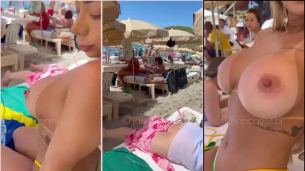 Jully Queiroz desfilou sem sutiã na praia pública